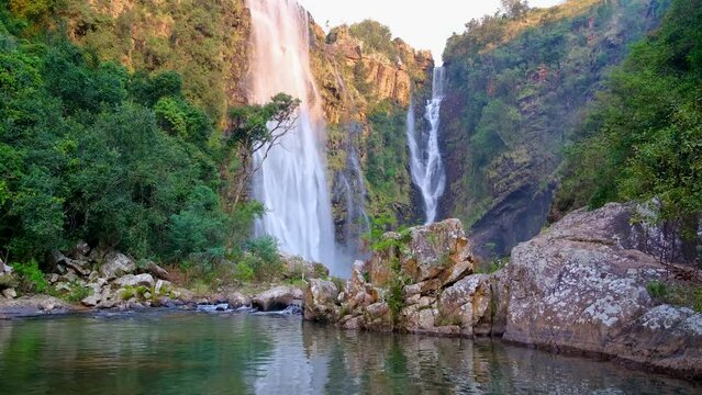 Lisbon Falls running into crystal clear Lisbon River pool with reflection, Panorama Route, Graskop, Mpumalanga, South Africa