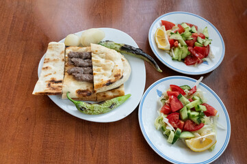 Shish meatballs and salad on a plate