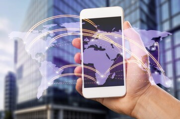 Hand holding a modern smartphone with infographic