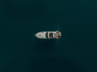 Drone topdown shot of a yacht, sailing boat