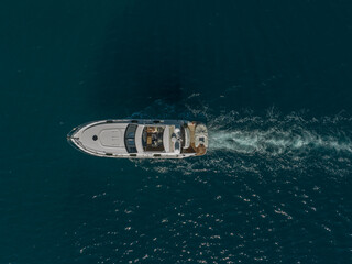 Drone topdown shot of a yacht, sailing boat