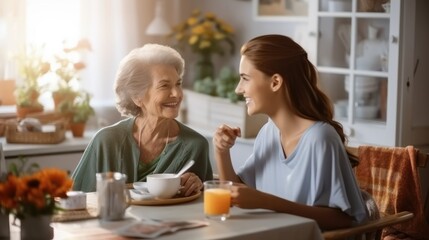 Obraz na płótnie Canvas Nurse spending quality time with senior woman in nursing home.
