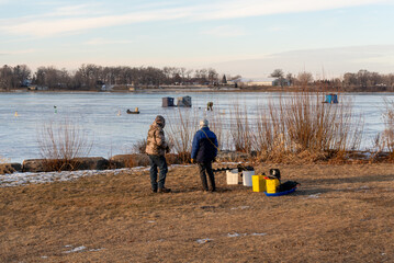 Ice Fishing In January On Fox River In De Pere, Wisconsin