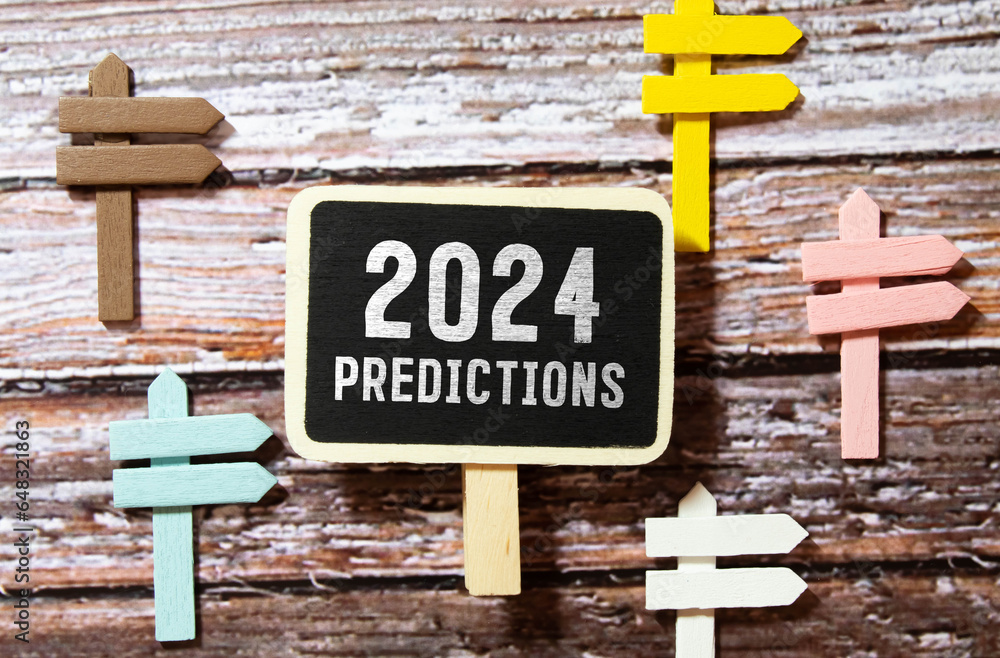 Aufkleber 2024 predictions wooden table.yellow notepad and open notebook with text