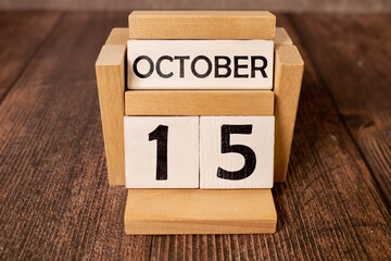 Wooden cubes with date on white background. 15th of October