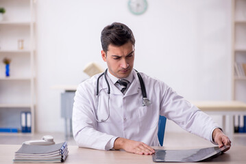 Young male doctor radiologist working in the clinic