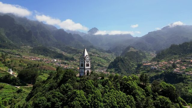 Stunning aerial footage view from the Chapel of Saint Fatima (Capelinha de Nossa Senhora de F&aacute;tima) on sunny day with blue skies in Sao Vicente