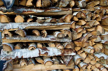 Close-up of wood pile with split birch wood.
