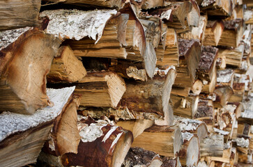 Close-up of wood pile with split birch wood.