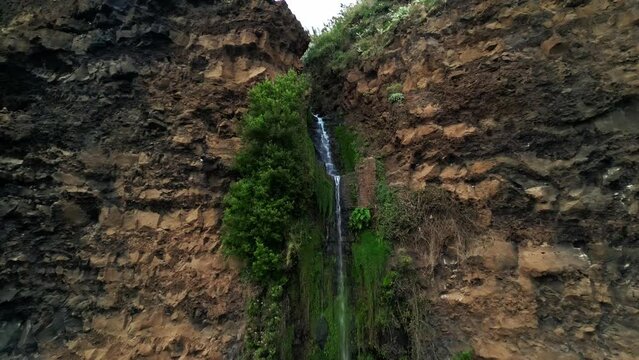 Stunning footage of Cascata dos Anjos Waterfon in the evening