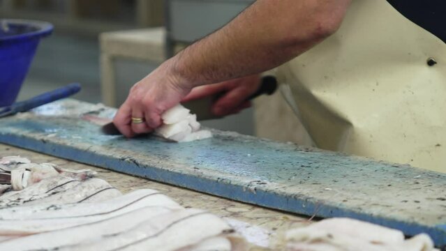 Footage of busy fish stals at Farmers Market in Funchal city