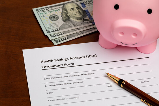 Health savings account, HSA, form with piggy bank and cash money. Health insurance, medical and dental healthcare costs concept.