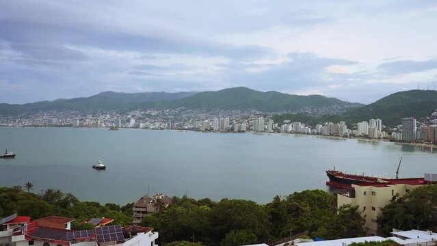 Tropical beach Acapulco. Hotels and City. Landscape of Acapulco city.  Beach Resort. Sea Recreation and Holidays. Fantastic Vacations in Mexico - Acapulco