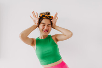 Happy Asian woman wear colorful outfit cute charming posing isolated.