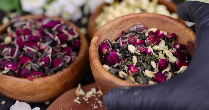 green tea mixed with dried rose and jasmine flowers, tea preparation with the addition of tea rose and jasmine flowers for taste and aroma
