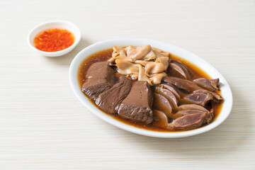 stewed duck offal in brown soup