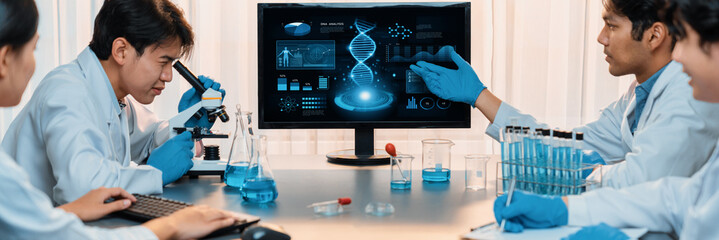 Dedicated scientist group working on advance biotechnology computer software to study or analyze...