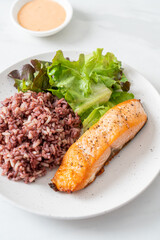 grilled salmon fillet steak with rice berry and vegetable