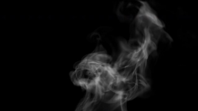 Abstract smoke background. White steam flowing on black background. Luma matte.
