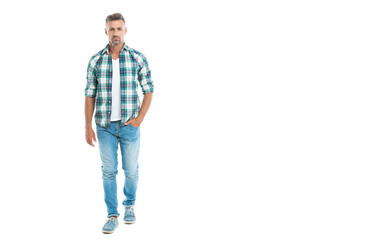A casual man in a checkered shirt and jeans, copy space. A cool casual man against white background. A casual man wearing a plaid shirt and jeans. A handsome casual man looking confident and stylish