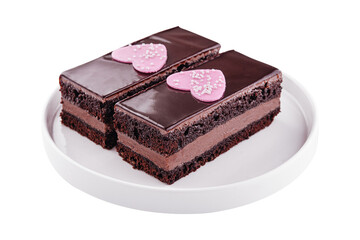 slices of cake in chocolate icing isolated on white