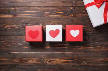 Festival of love, gift boxes on old wooden floor with free space