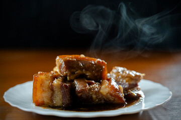 braised pork belly in sweet black soy sauce, Chinese food.
