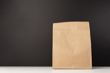 School lunch bag with a brown paper package