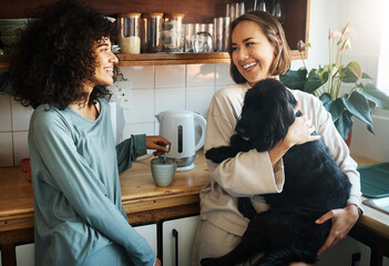 Happy, dog and morning with lesbian couple in kitchen for relax, support and care. Canine animal, love and smile with gay women and pet puppy at home for bonding, playful and happiness together