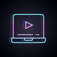 Glowing neon line Online play video icon isolated on black background. Laptop and film strip with play sign. Vector