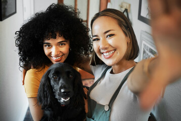 Smile, selfie and portrait of lesbian couple with dog in modern apartment bonding together. Love, happy and interracial young lgbtq women taking a picture and holding animal pet puppy at home.