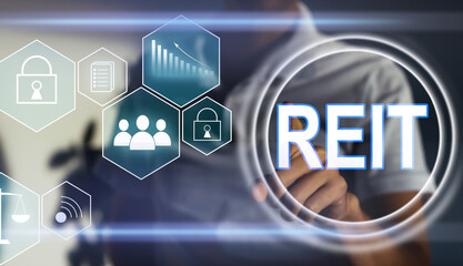 REIT, Real Estate Investment Trust concept, Person hand using smart phone with Real Estate Investment Trust icon on virtual screen.