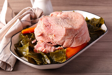 Cooked bacon with cabbage and carrot