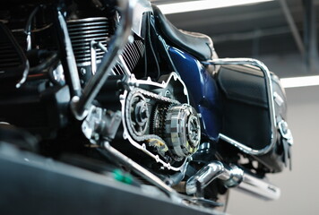 Blue motorcycle in repair sevice closeup background. Motorbike parts service concept