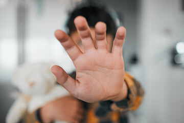 Child, stop and hand closeup for protest, rejection and sign for prohibition of domestic violence....