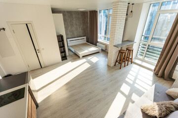 Interior of modern luxury apartment, empty attic, kitchen open space.