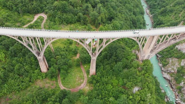 Aerial of Djurdjevica Bridge over Tara river canyon in Montenegro. Grerat tourist attraction and unique architectural structure