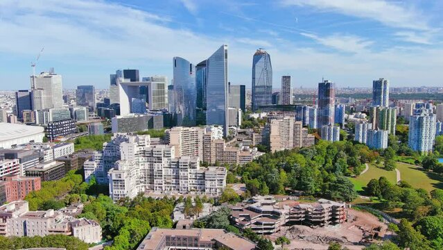 Paris: Aerial view of skyscraper skyline of La Defense, major business district in capital city of France from Parc Andr&eacute; Malraux park, sunny day with blue sky&mdash;landscape panorama of Europe from above