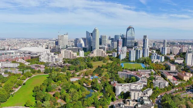 Paris: Aerial view of skyscraper skyline of La Defense, major business district in capital city of France from Parc Andr&eacute; Malraux park, sunny day with blue sky&mdash;landscape panorama of Europe from above