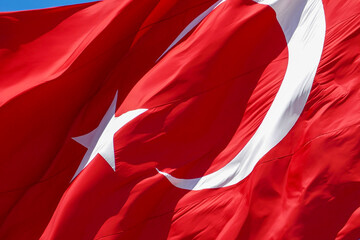 flag of the republic of turkey, turkish flag waving in the wind, blue sky and the flag of the...