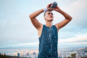 Fitness, water and fatigue with a sports man outdoor, tired after running a marathon for cardio...