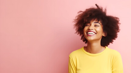 African American woman laughing isolated on yellow background - obrazy, fototapety, plakaty