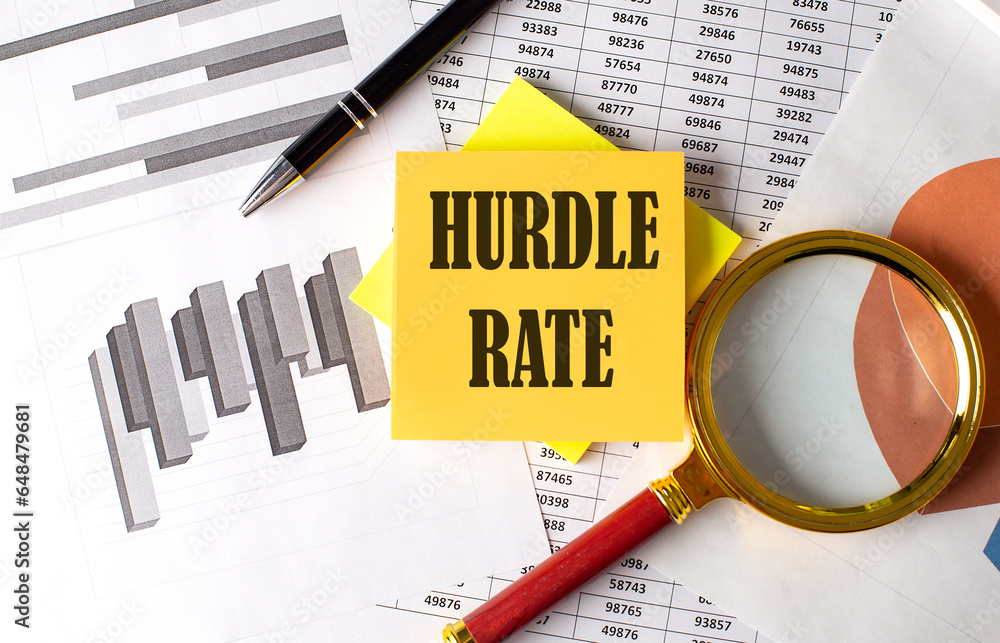 Poster hurdle rate text on a sticky on the graph background with pen and magnifier