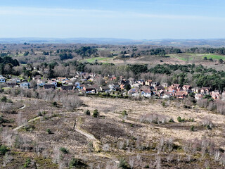 Fototapeta na wymiar Aerial view of housing on the edge of heathland in southern UK