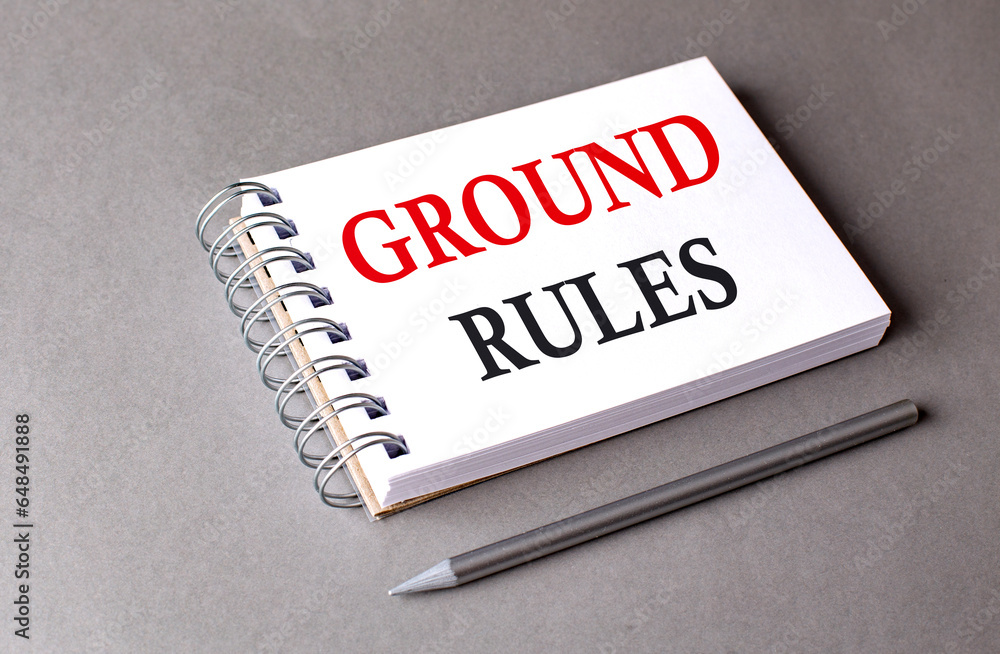 Poster ground rules word on notebook on grey background