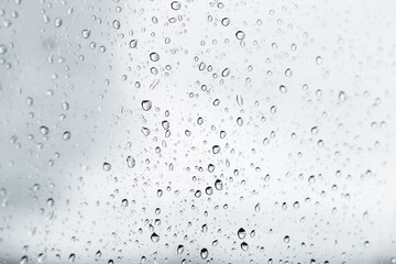 Water drops on glass in car