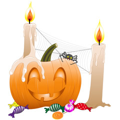 Halloweenkürbis mit Kerzen, Spinne und Bonbons