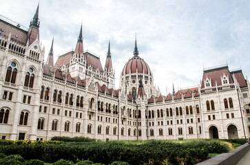Fototapeta na wymiar Budapest, Hungary, August 15, 2023. Beautiful Facade and Dome of Hungarian Parliament Building.