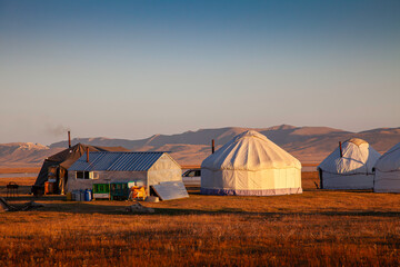 sunset at the yurt camp at Son Kul, Kyrgyzstan - 648536634
