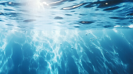 A beautiful background image resembling the texture of a water surface, featuring captivating light reflections and glares in varying shades of light blue.